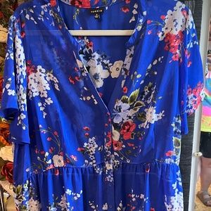 High low short sleeve button up blouse